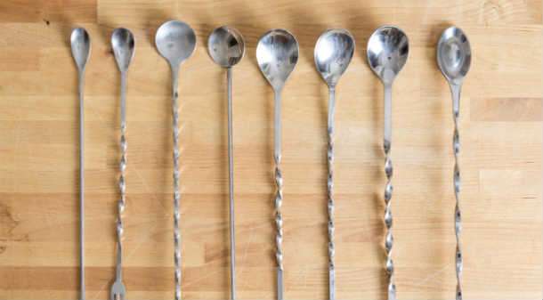 8 bar spoons of various designs lined up in a row