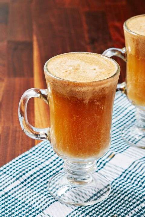 Hot buttered rum served in a glass mug