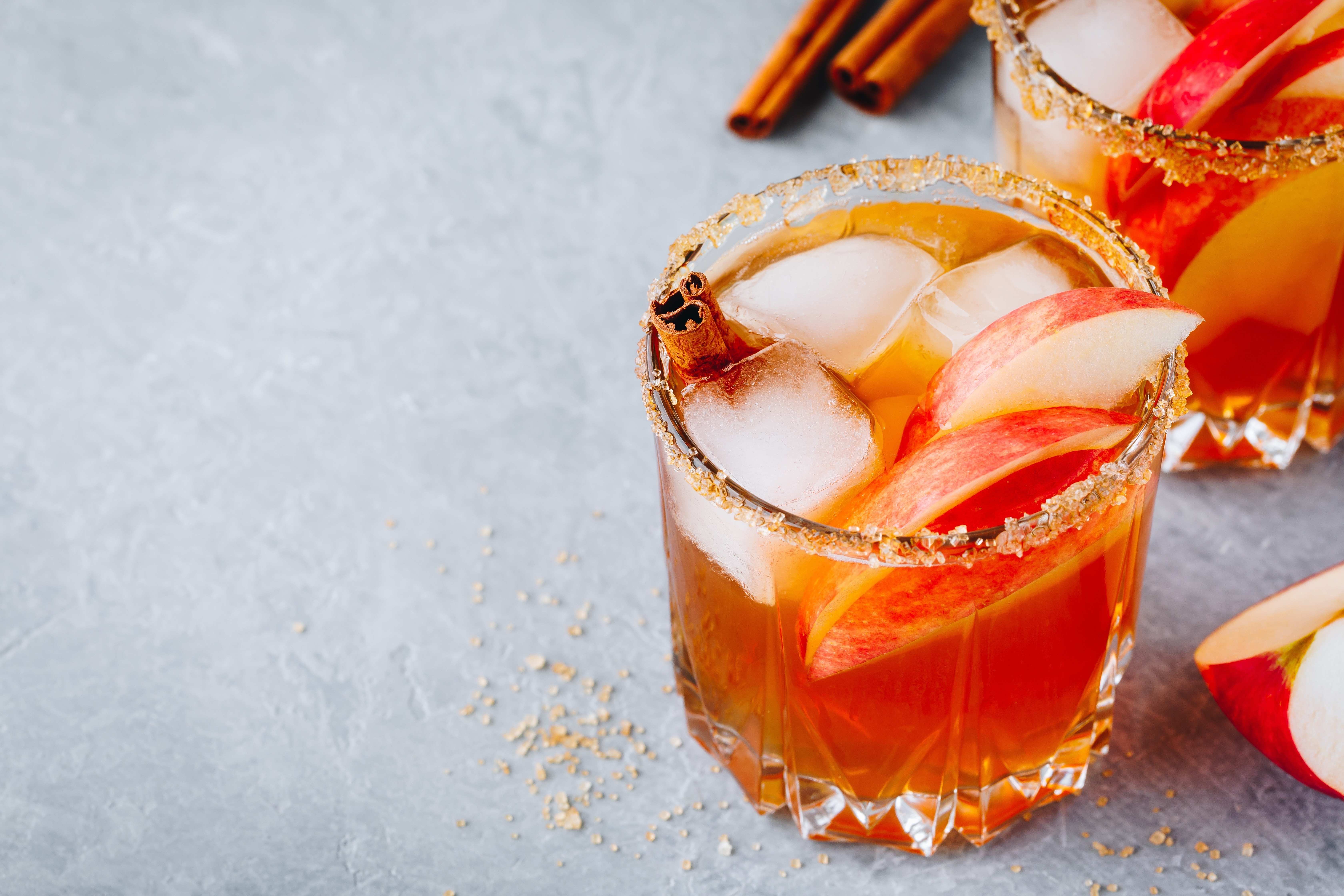 Bloody Mary Cocktail in glasses with garnishes. Stock Photo by nblxer