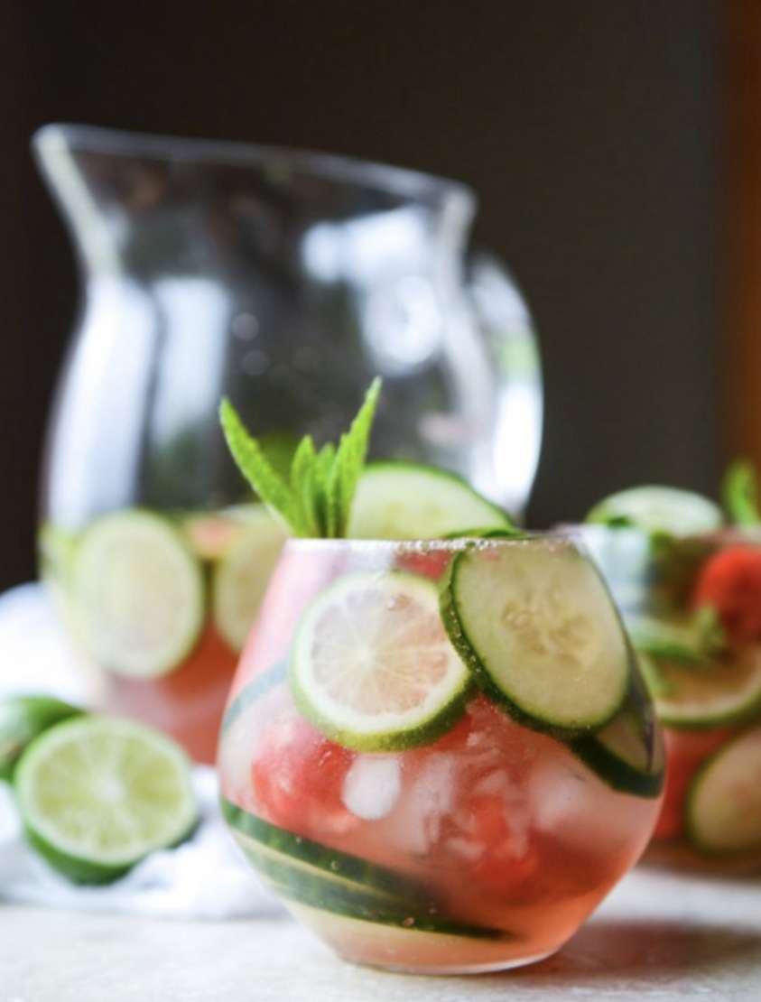 A glass of cucumber-watermelon sangria