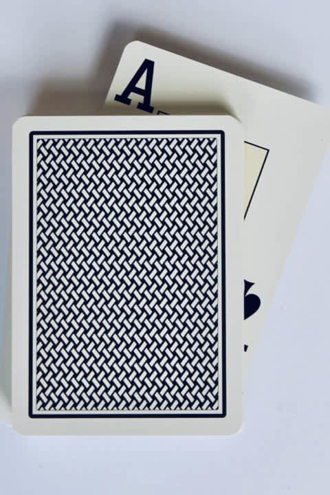 Playing cards with ace of spades