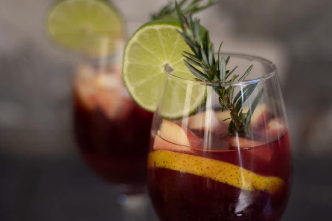 Two cups of red wine sangria. 