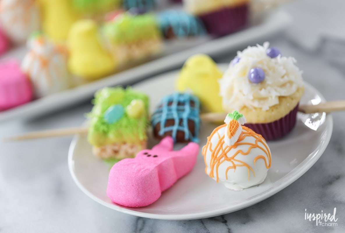 Peeps, cupcake, Rice Krispie treats and more festive desserts on a plate.