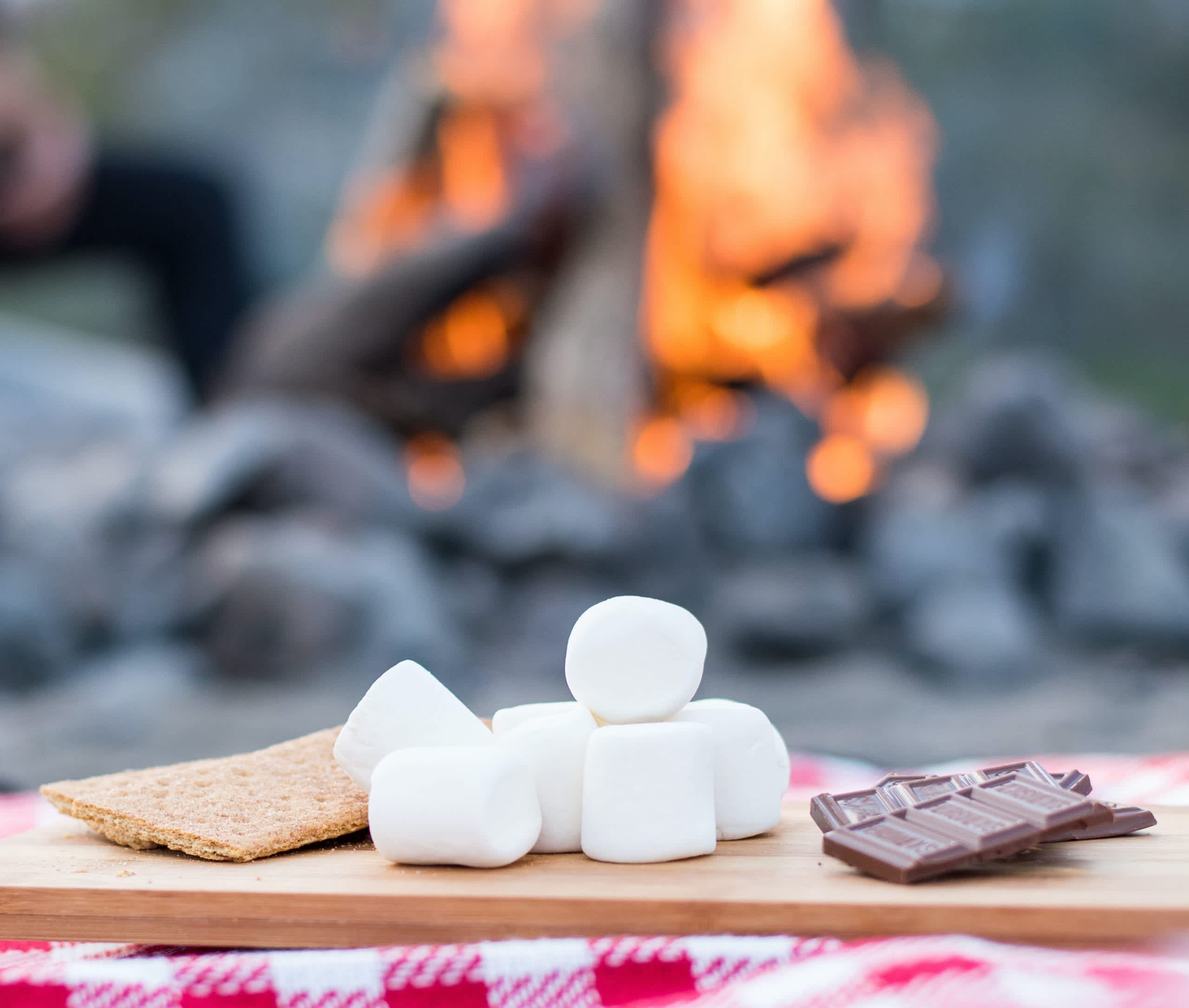 S'mores ingredients by a summer campfire