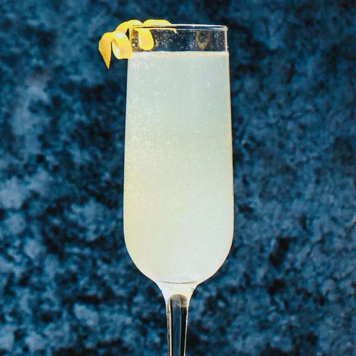 Alt text: Photo of the French 75 cocktail in a champagne glass