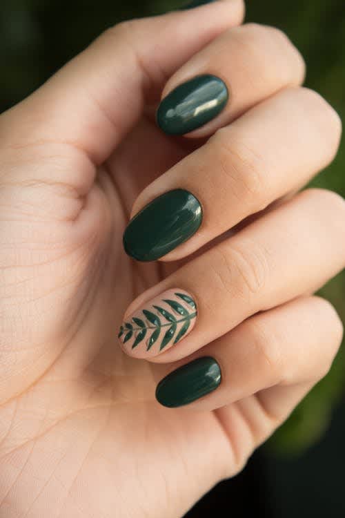 Green nails with 1 accent nail featuring a botanical plant on the ring finger