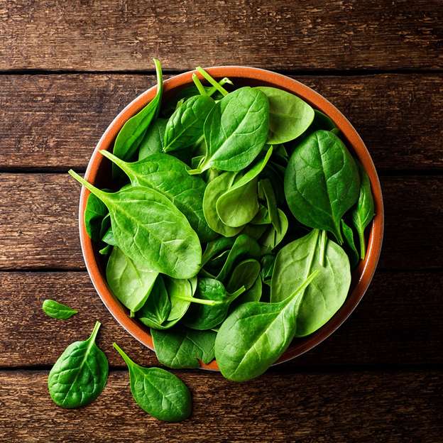 A bowl of spinach leaves