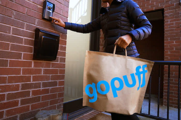 Gopuff delivery partner ringing a customer's doorbell