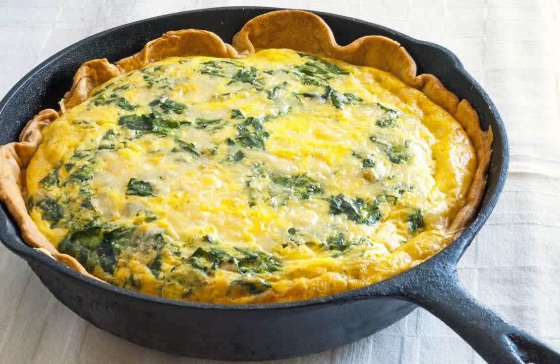 Spinach quiche in a cast iron skillet 