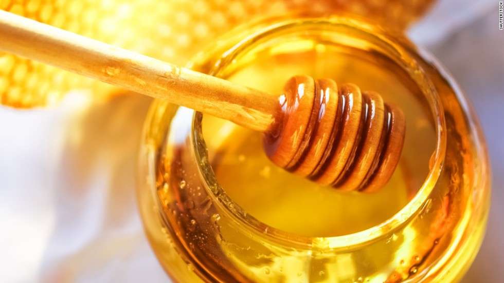 Honey stick, a honey jar and honeycomb