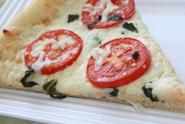 Close up of four-cheese Margherita pizza