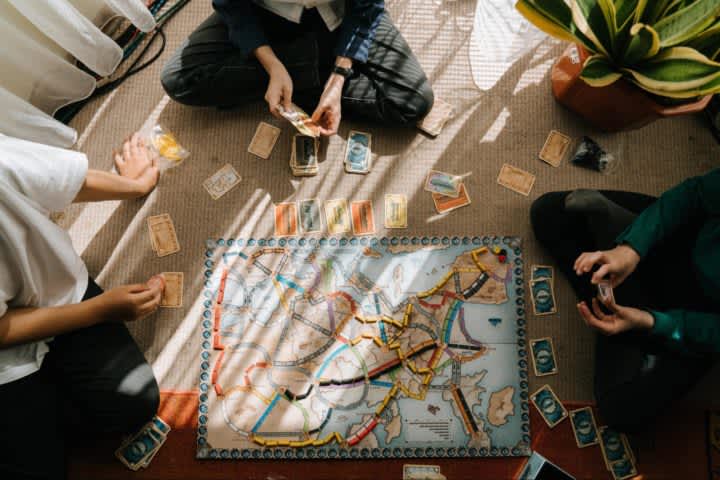 Kids playing a board game