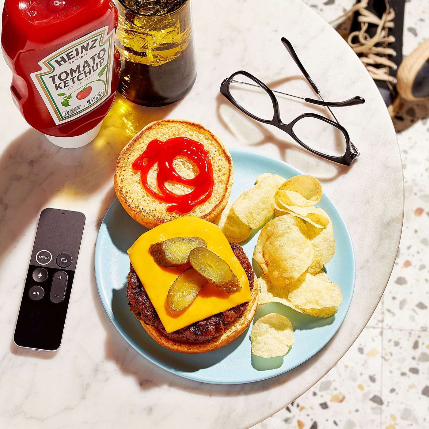 A lifestyle shot of a delicious cheeseburger made with ingredients from Gopuff