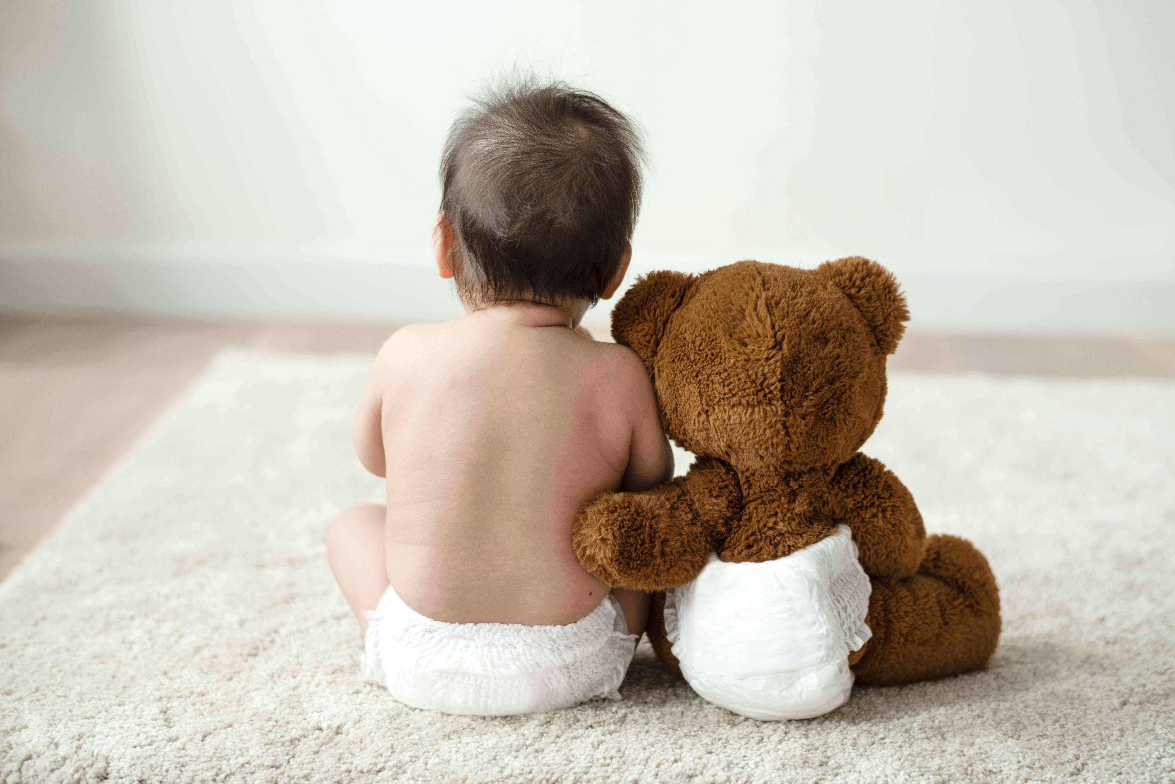 baby with a teddy bear