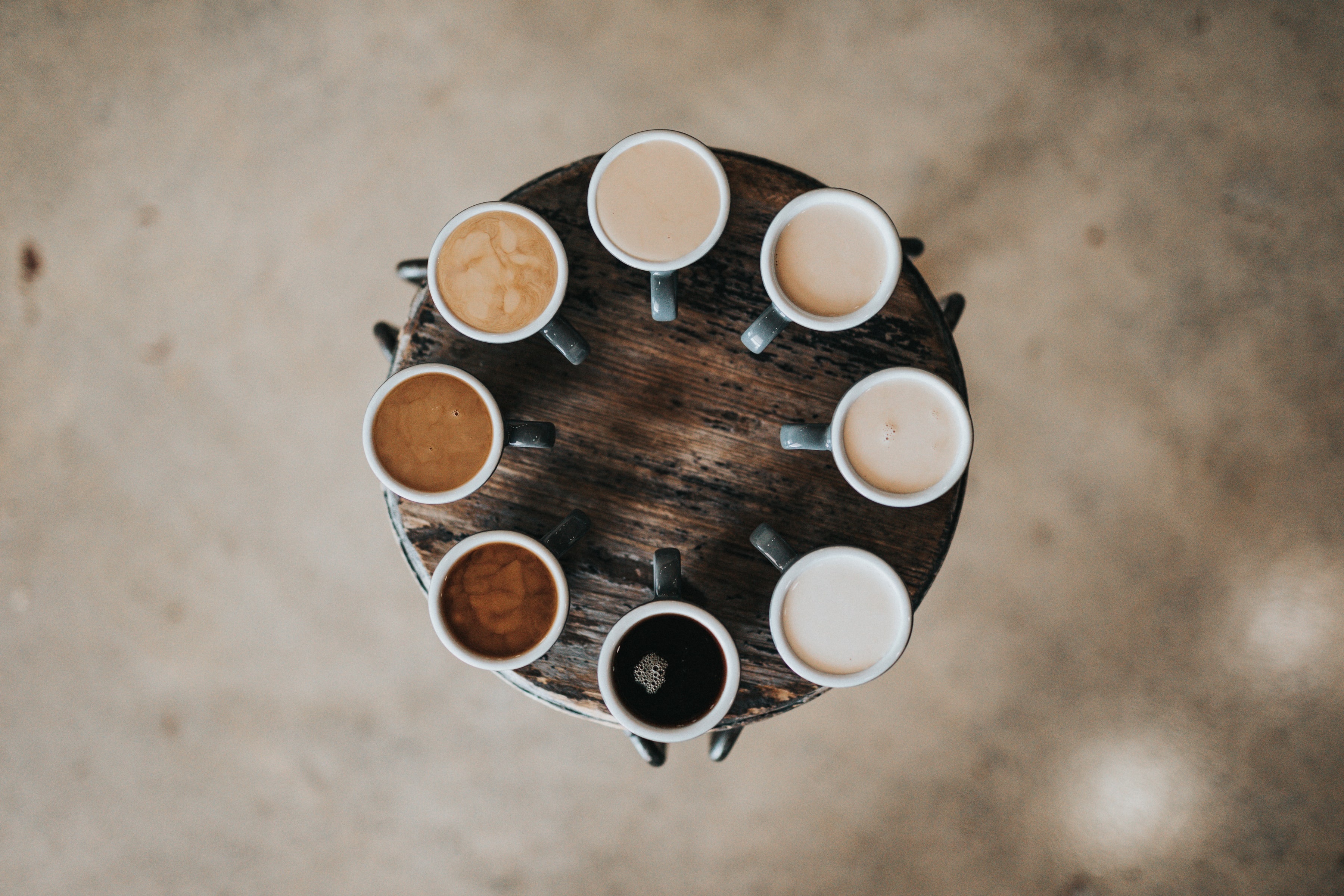 Cups of coffee on a little circular table