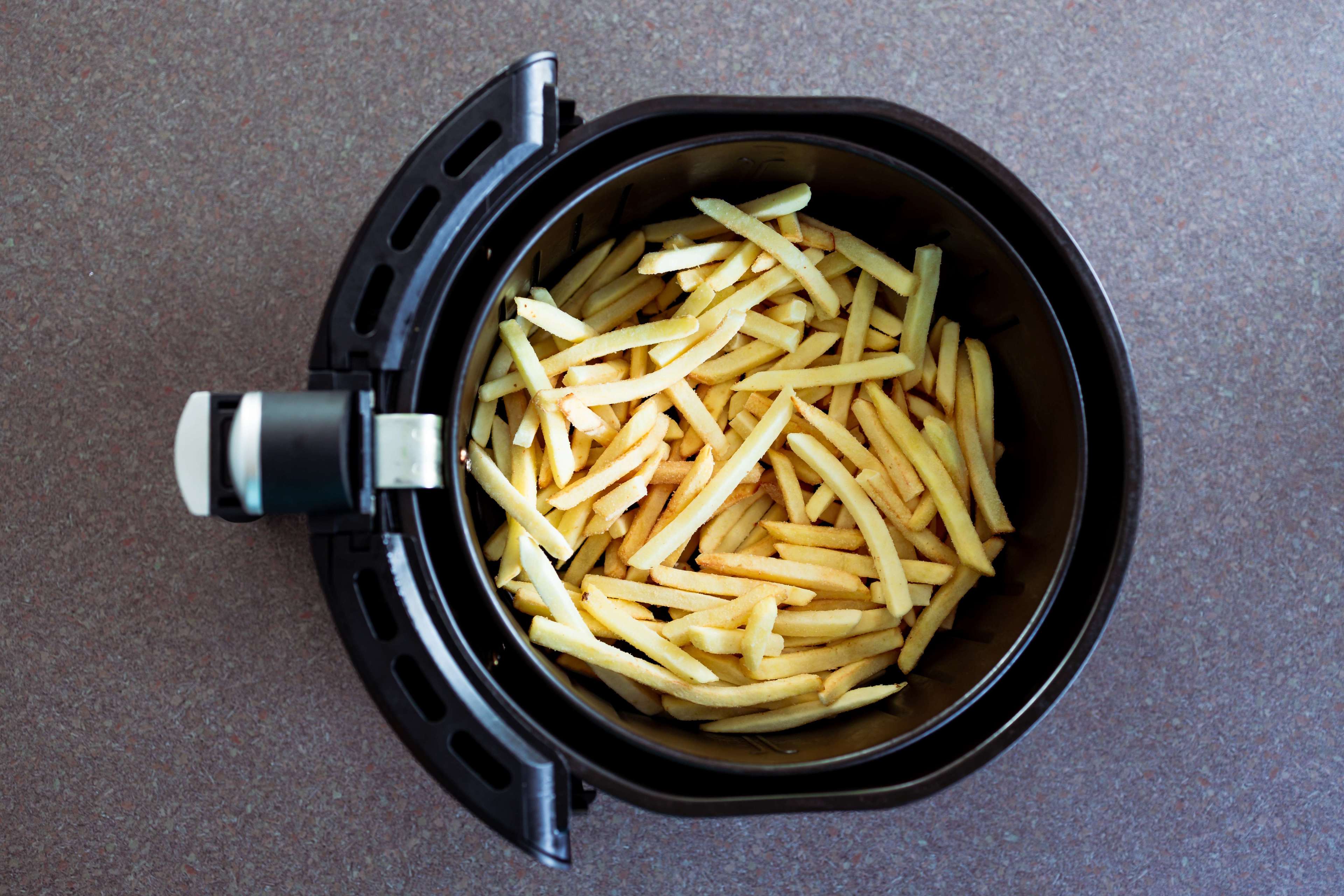 61b28e547c85af92b23a40cb_french%20fries%20cooked%20in%20an%20air%20fryer.jpeg