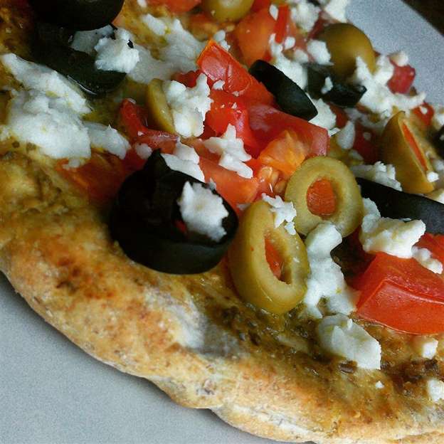 Close up of Mediterranean Pesto pizza
