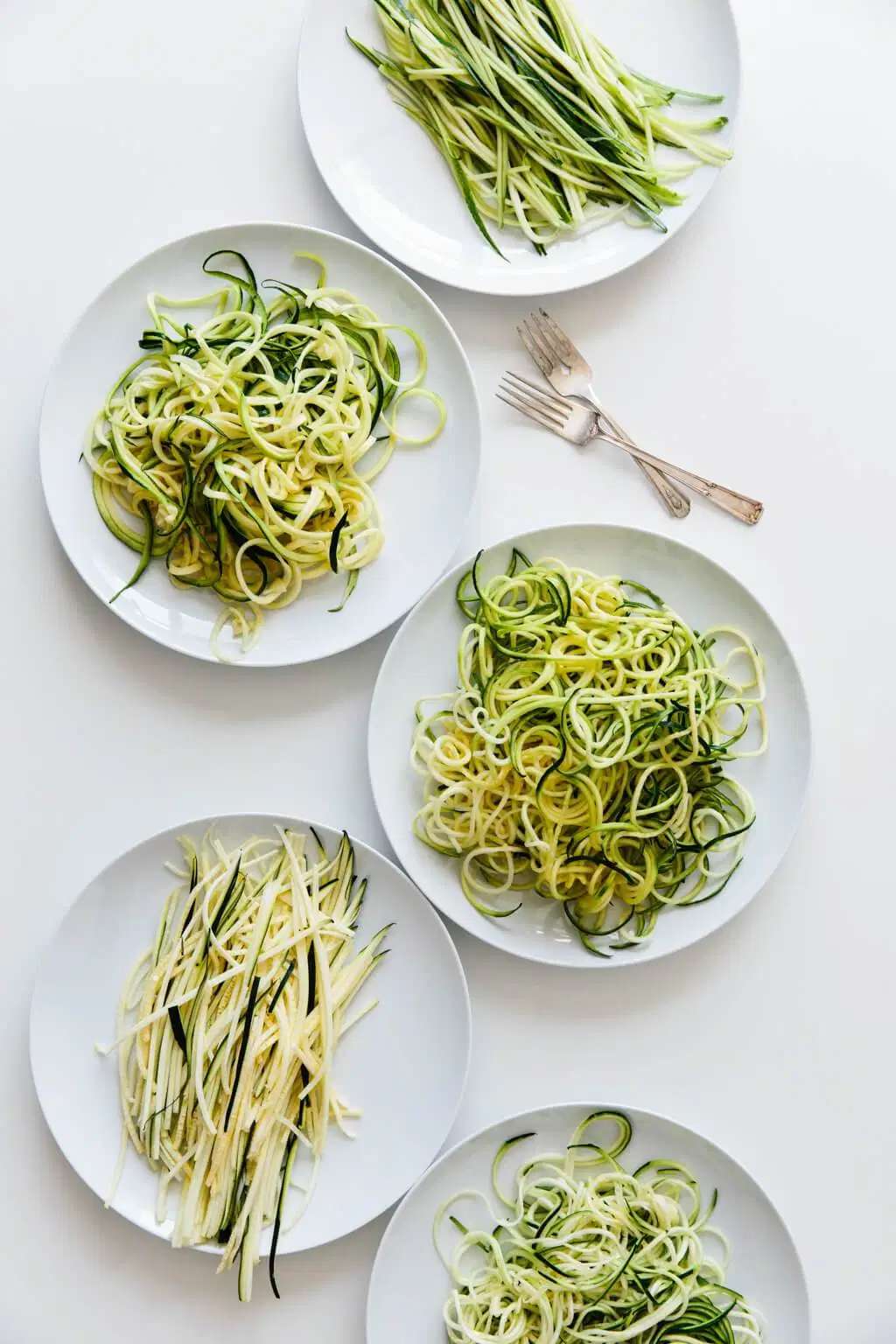Zucchini noodles on plates