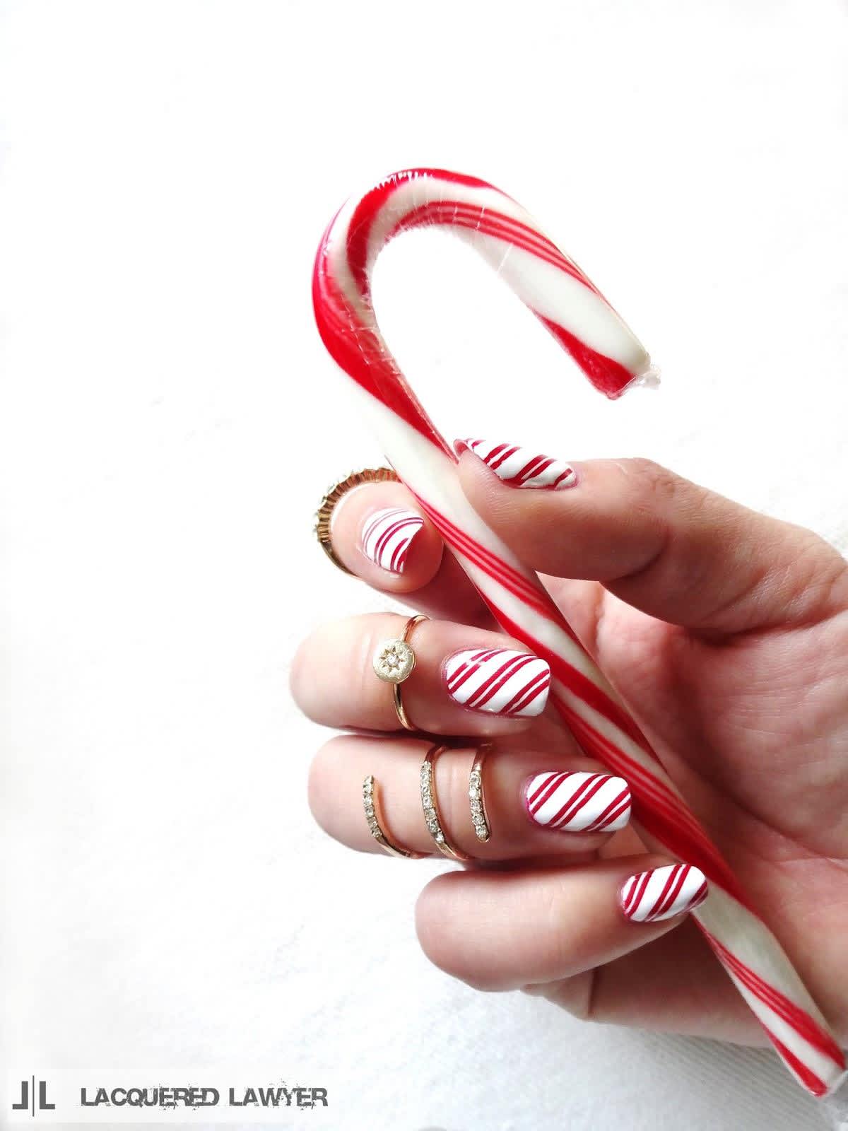 Red & white striped candy cane nails 