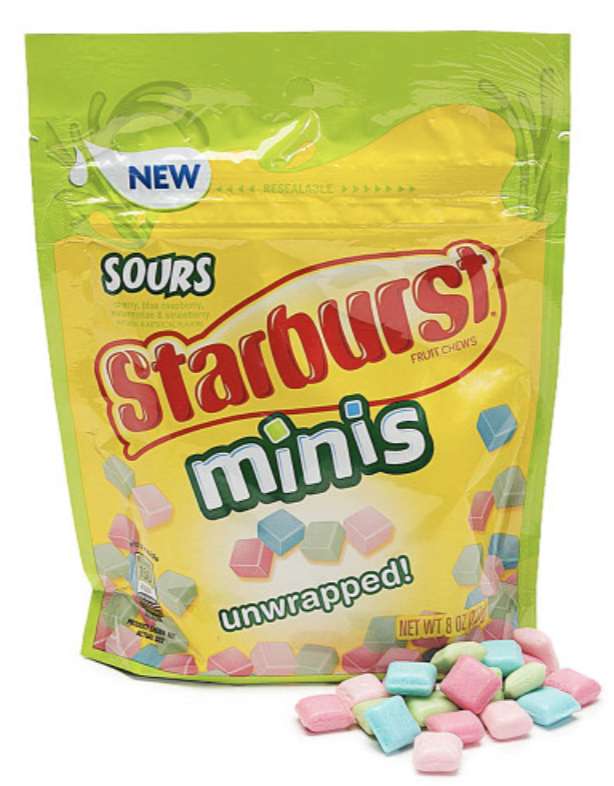 A bag of Starburst Minis Sours Unwrapped and pile of Starburst candy