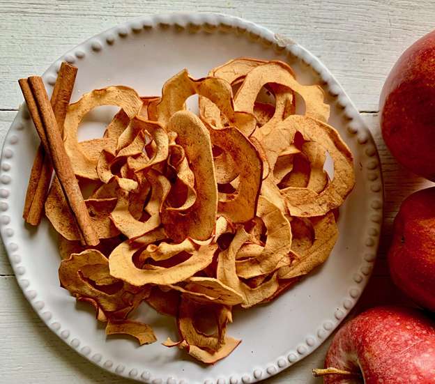 Baked apple chips on a plate