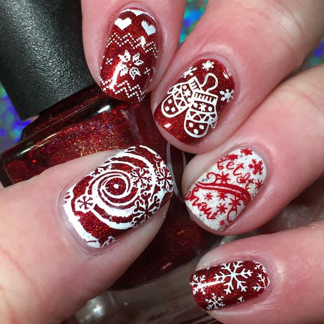 Red & white nails with assorted Christmas nail art, including mittens, snowflakes & Let It Snow text 