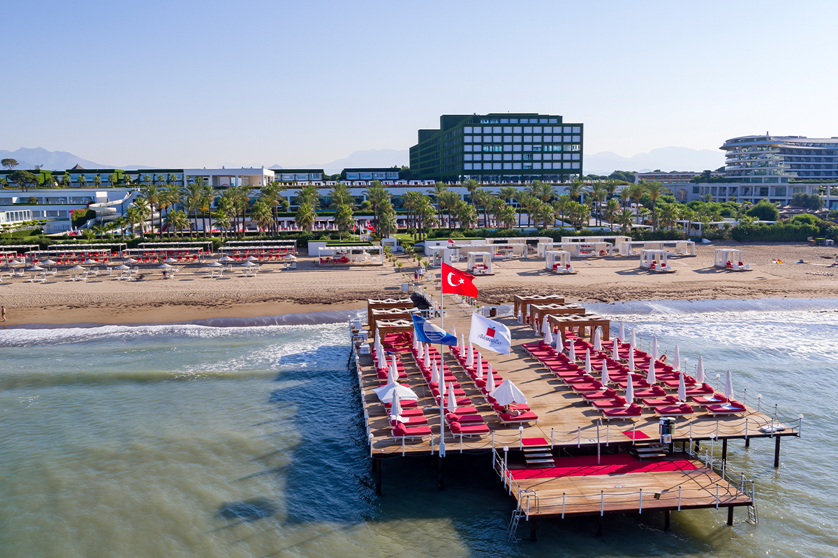 Adam & Eve Hotel beach area with sunbeds