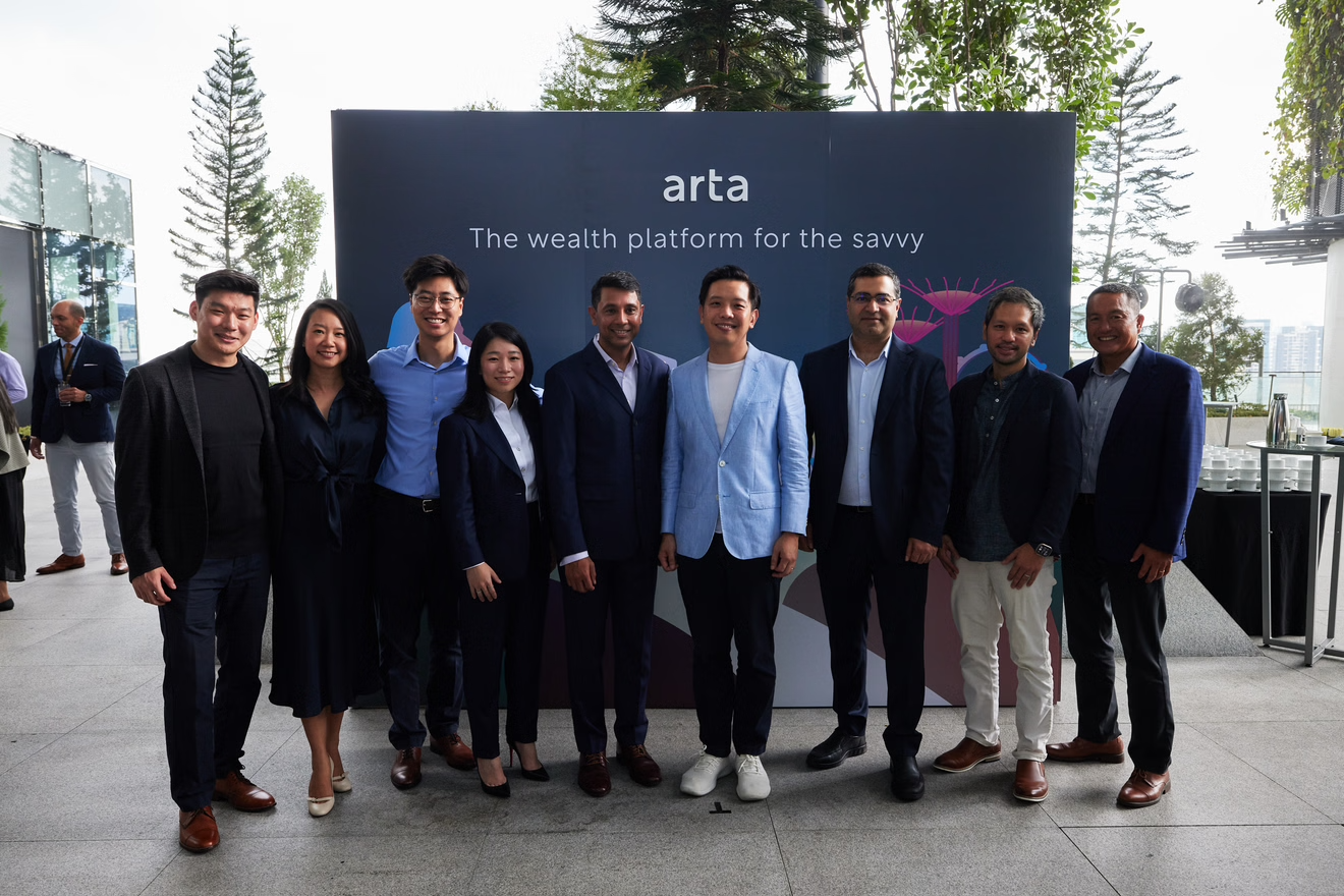 Ceasar Sengupta and the leadership of Arta Finance with MOS Alvin Tan.