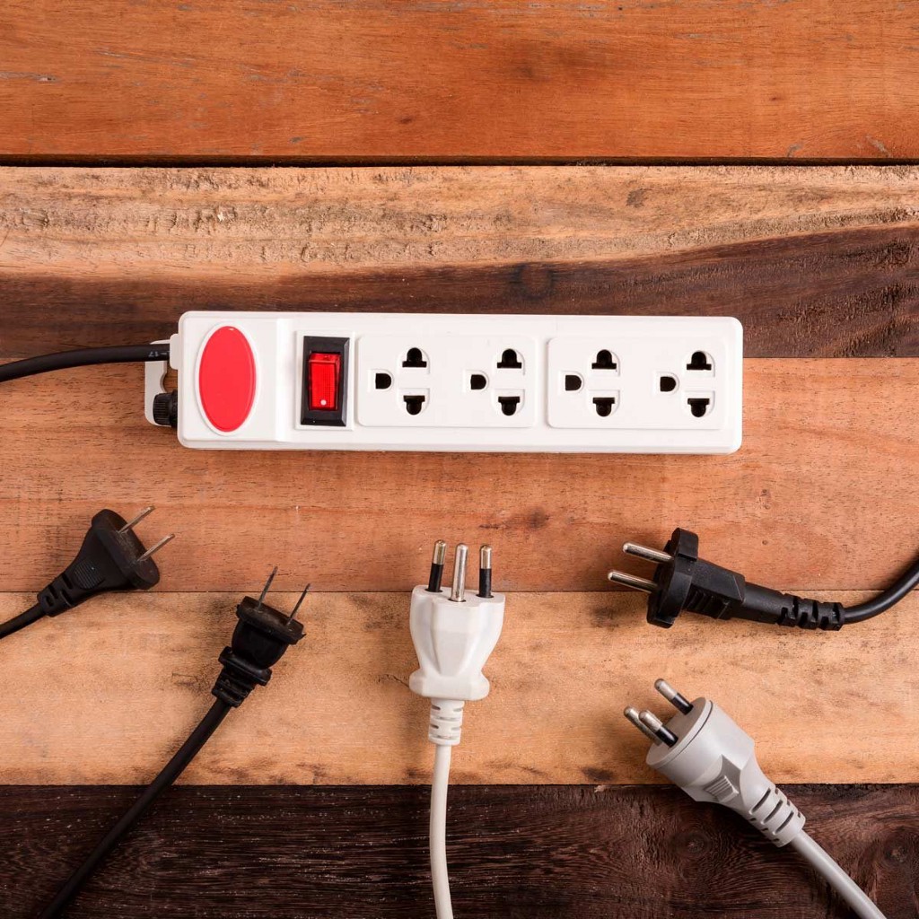 a power strip with a bunch of plugs near it
