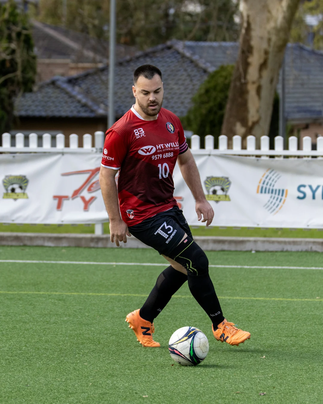 Man playing soccer on a field