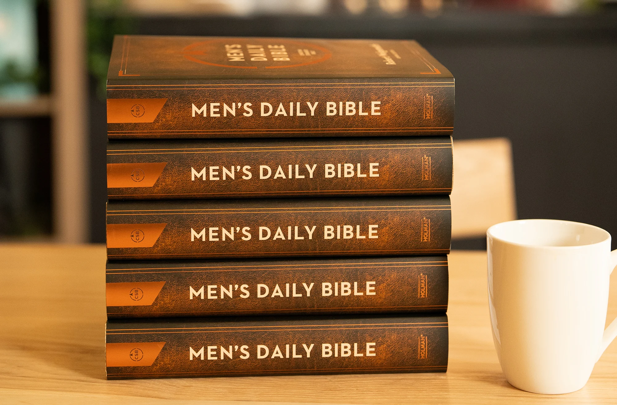 A stack of Men's Daily Bibles for bulk order