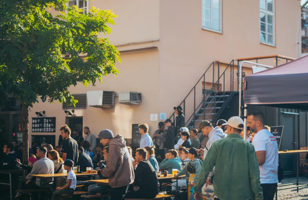 People outside a restaurant in Prague