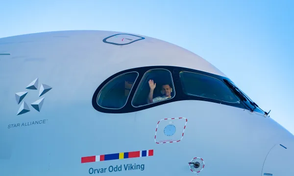 SAS pilot waving