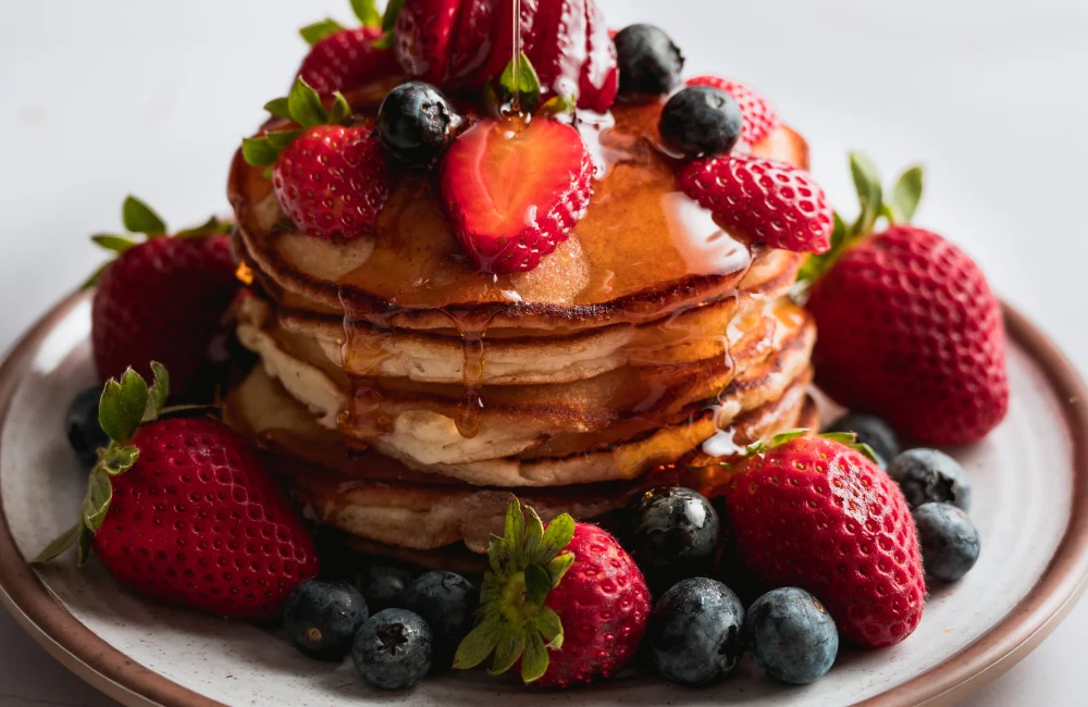 American pancakes served with fresh berries