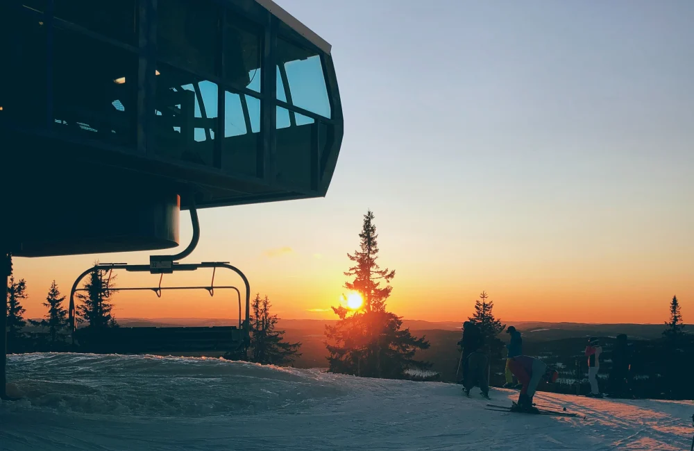 A ski lift at sunset