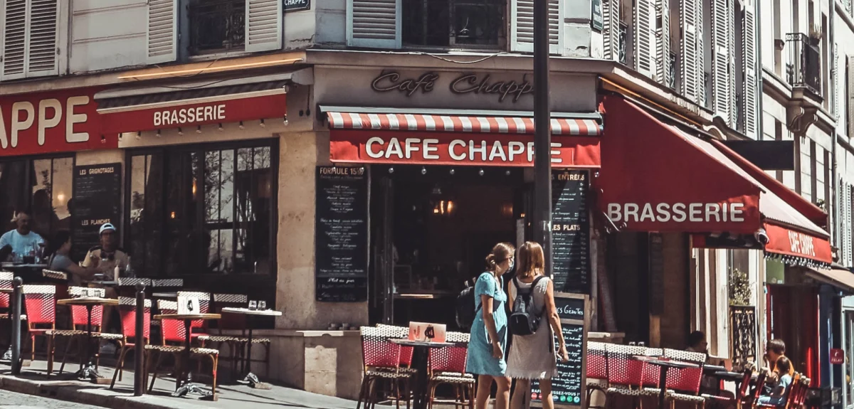 Two women outside a cafe in Nice