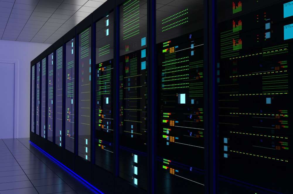 A row of illuminated server racks in a data center