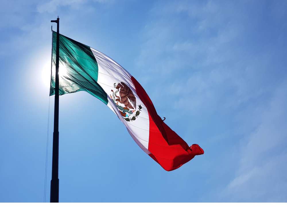 Mexico a flag on a pole