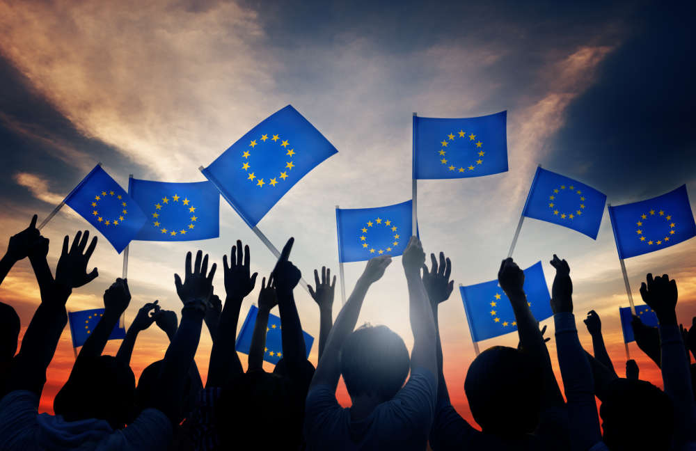 People holding flags of the European Union