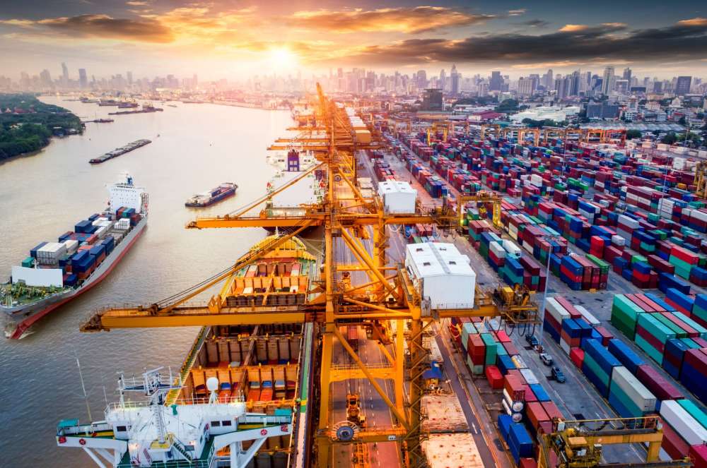 shipping port with sunset in the background