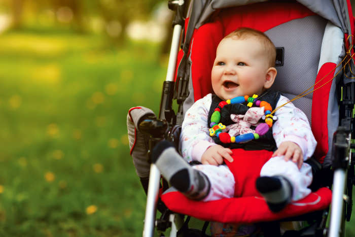 baby in stroller - juvenile products market safety