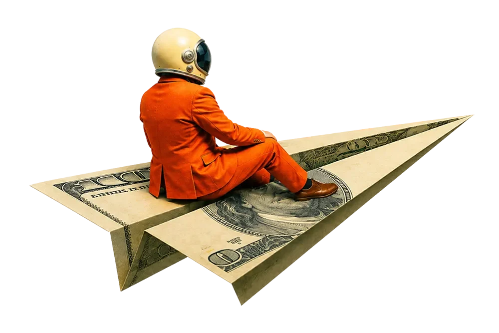 Person in orange suit and gold helmet riding a paper airplane made from a dollar bill on white background.