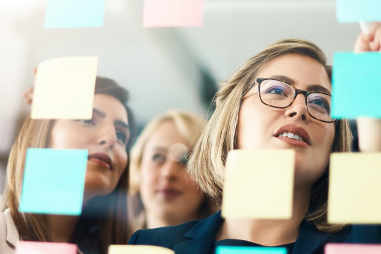 female coworkers card sorting exercise