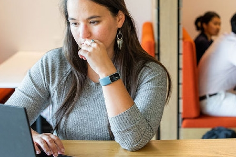 woman sitting at computer