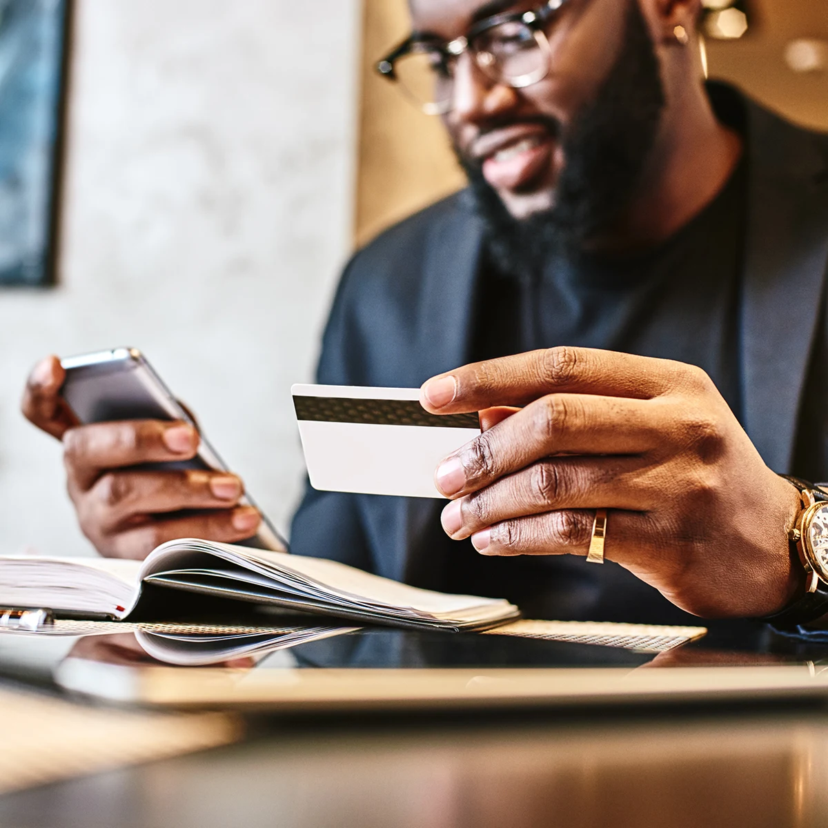 Man working with mobile banking app