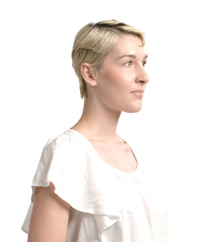 Young white woman with short blonde hair, profile view
