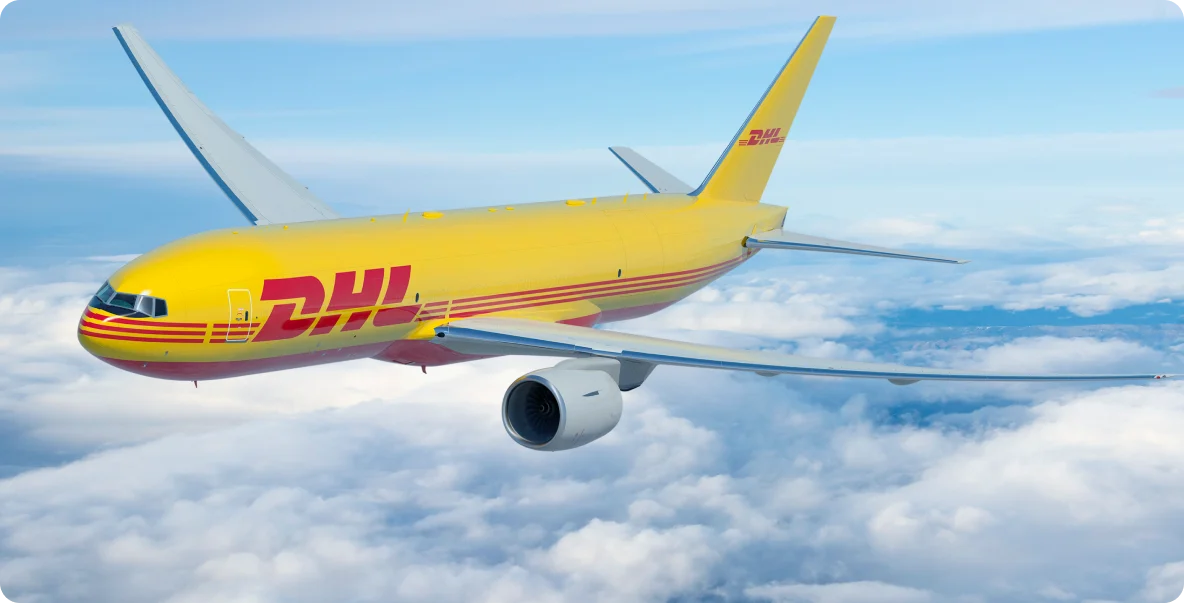 DHL Plane flying above the clouds