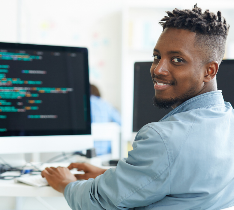 young person in coding job