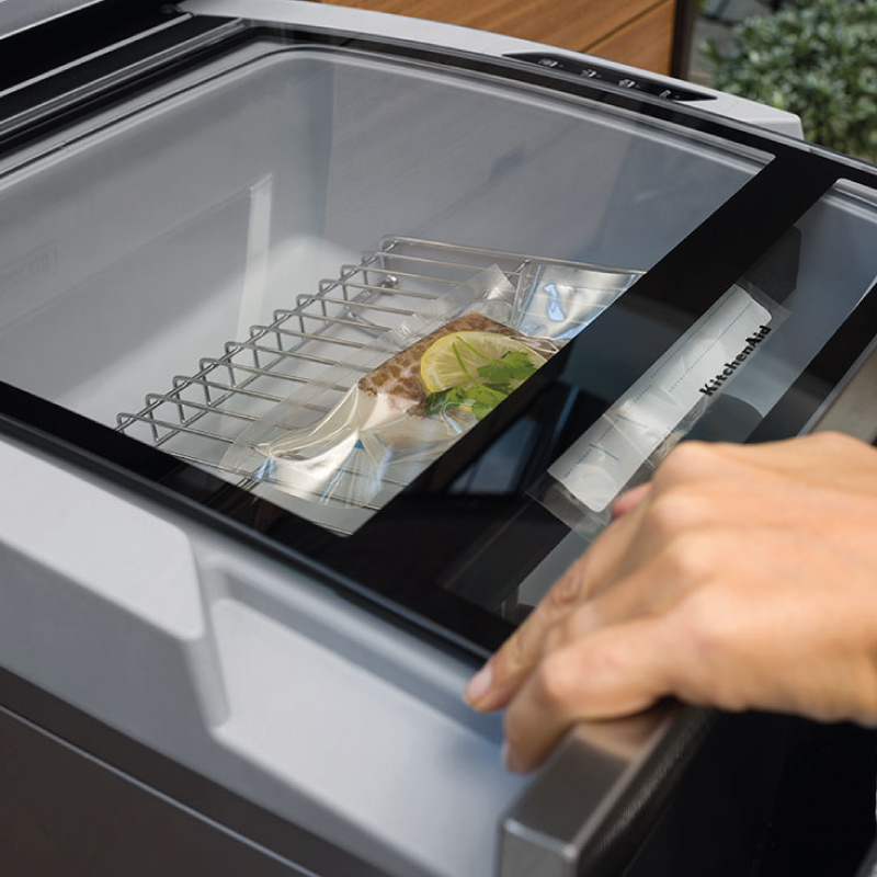 Vacuum-sealing ingredients in special pouches using the vacuum machine