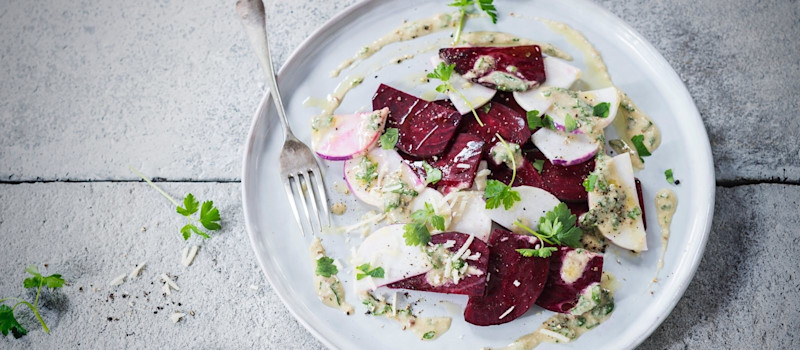Turnip and beetroot carpaccio with anchovy and almonds pesto sauce